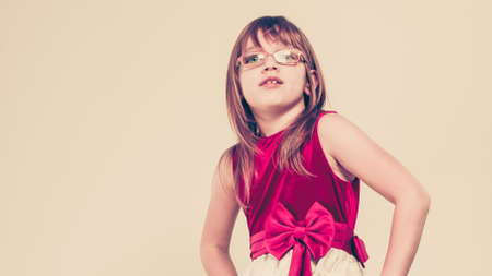 Charming little girl in beauty princess dress. Smiling lovely cute female child.の写真素材