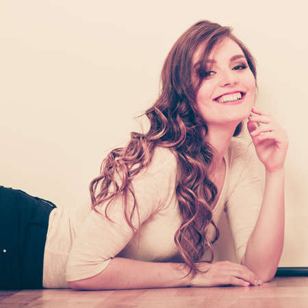 Sexy alluring woman. Beautiful and sensual young girl posing in studio.の写真素材