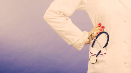 Medical examinations concept. Part body doctor pediatrician with stethoscope. Female physician and professional medic tool.の写真素材