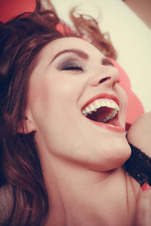 Portrait of happy woman. Attractive smiling young girl with long hair.の写真素材