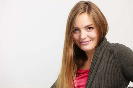 Very happy and satisfied female. Beautiful long brown haired woman portrait
