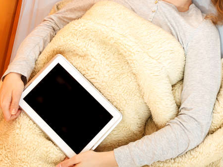 Human holding computer tablet with blank screen copyspace. Technology advertisement.の写真素材