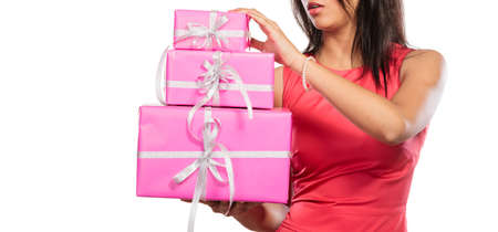Close up of human with pink rose boxes gifts isolated on white. Christmas xmas winter time season...