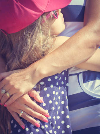 Love and good feelings in family. Childhood and parenthood concept. Lovely cute girl and woman in...