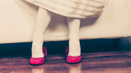 Part body girl wearing beutiful princess fairy dress. Little child in ballerina clothes indoor.の写真素材