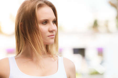 Beauty young blondie girl portrait. Gorgeous lovely woman outdoor. Positive emotion feelings.の写真素材