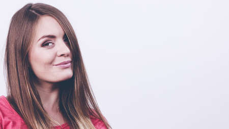 Happy girl in pink clothing. Young cheerful woman portrait.  Fashion beauty coiffure lifestyle...