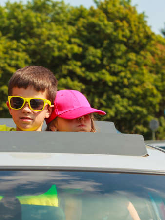 Summer holidays and common travel. Lovely happy active family on vacation trip. Relatives spending enjoyable good time together.の写真素材