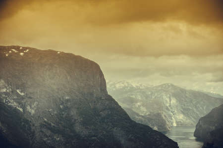 Tourism vacation and travel. Fantastic view of the Aurlandsfjord landscape from Stegastein viewpoint, Norway Scandinavia.の写真素材
