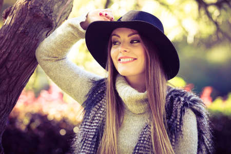 Fashion and style of female. Attractive and fashionable woman outdoor. Portrait of charming young...