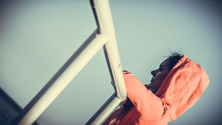 Beauty resting woman outdoor. Attractive traveller girl spending time on fresh air. Holiday and vacation.の写真素材