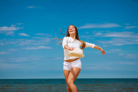 Happiness and craziness. Smiling crazy girl have fun outdoor. Young attractive long haired woman...