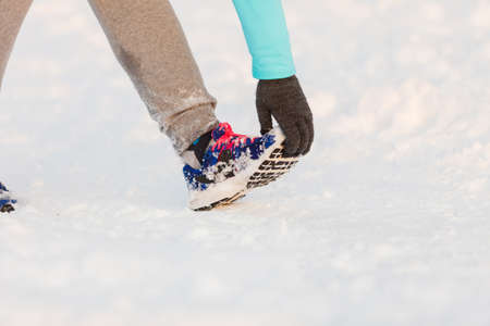 Person staying in shape in winter, maintaining weight and curves during winter time. Fitness health fashion nature conceptの写真素材