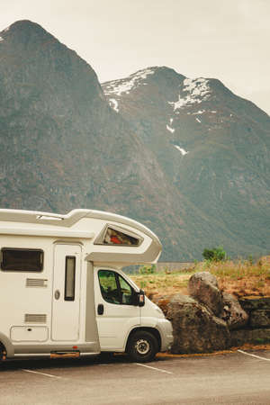 Tourism vacation and travel. Camper van and mountains landscape in Norwayの写真素材