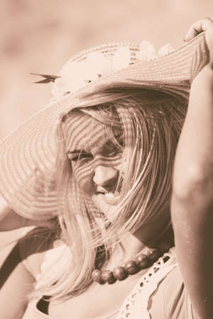 Summer time, shining sun concept. Sunny portrait of nice woman. Attractive lady has amazing necklace.の写真素材