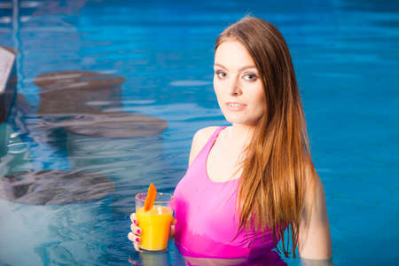 Relax, spa wellness concept. Charming woman having fun with cocktail drink alcohol. Pretty girl...