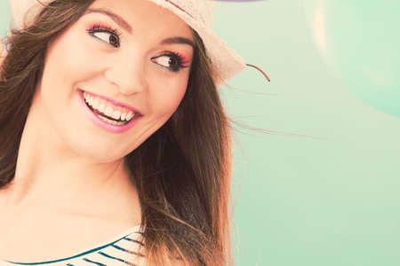 Smile and laugh. Vacation and rest. Portrait of happy lovely girl in straw hat. Young tourist woman...