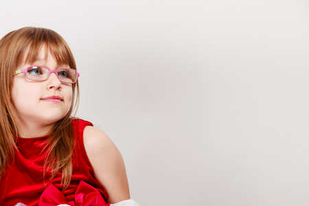 Charming little girl in beauty princess dress. Smiling lovely cute female child.の写真素材