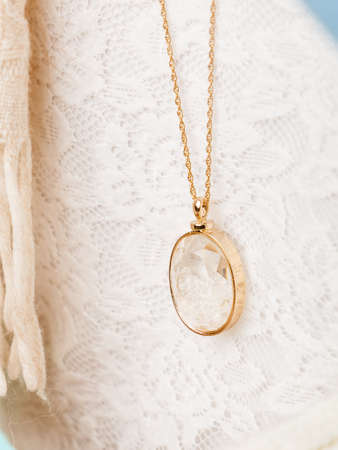 Beautiful necklace with white diamond on girl close upの写真素材