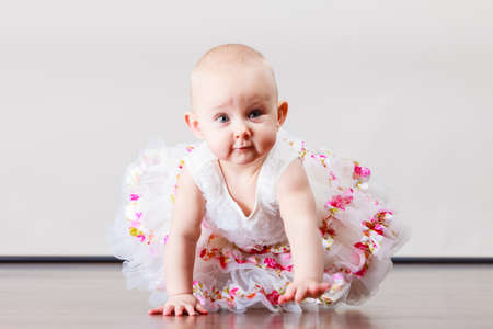 Lovely little child girl in princess fairy dress. Portrait of cute beauty sweet baby ballerina.の写真素材