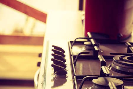 Kitchen furniture concept. Gas kitchen stove on white metalの写真素材