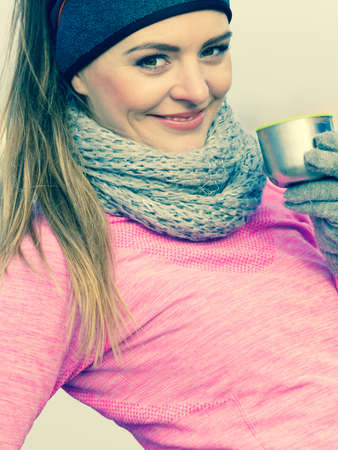 Woman athlete fit girl wearing warm sporty clothesの写真素材