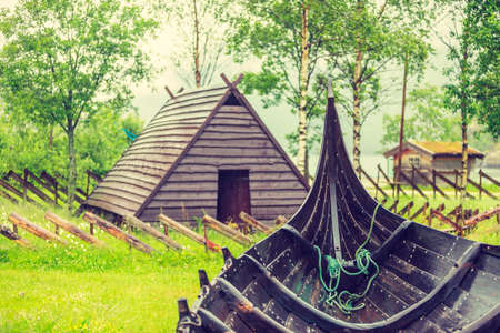 Part of old wooden viking boat in norwegian nature. Tourism and traveling conceptの写真素材