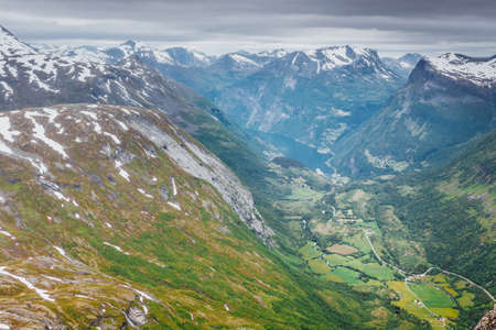 Tourism vacation and travel. Fantastic view on Geirangerfjord and mountains landscape from the Dalsnibba Plateau viewpoint, Norway Scandinavia.の写真素材