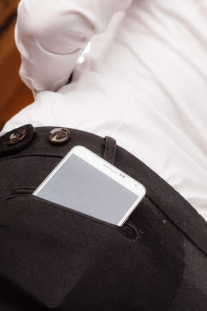 GDANSK, POLAND - DECEMBER 4, 2014: Samsung Galaxy Note 3 N9005 in pocket on December 4, 2014,...