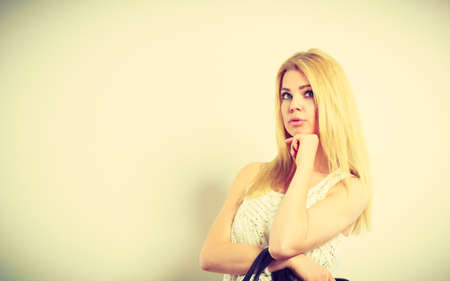 Beauty of feminine, beautiful women concept. Attractive blonde woman looking at copyspaceの写真素材