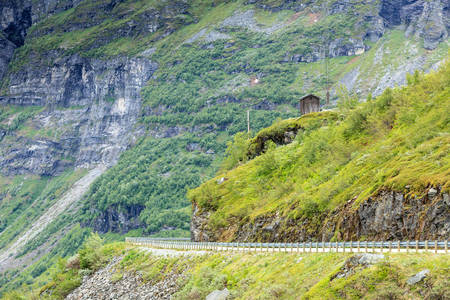 Road winding through norwegian mountains. Beautiful landscape. Travel and tourism.の写真素材