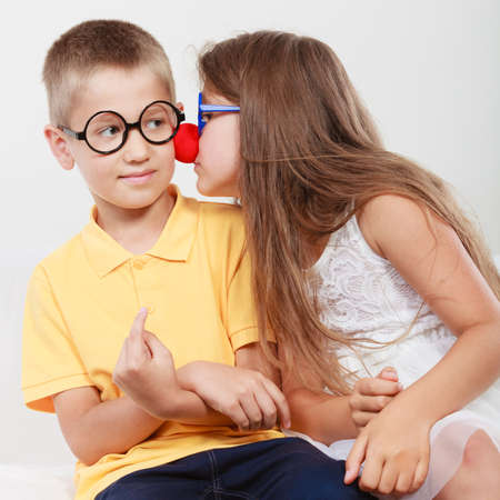 Happy and funny young siblings. Children playing with each other.の写真素材