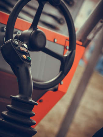 Agriculture equipment, agribusiness machinery and vehicles concept. Operating system on big industrial agricultural machineの写真素材