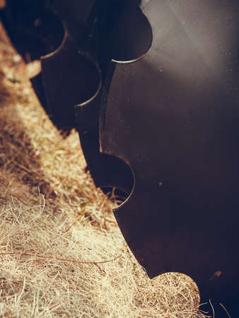 Agriculture equipment concept. Detailed closeup of disc harrow, agricultural machinery. Outdoor shotの写真素材