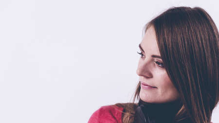 Happy girl in pink clothing. Young cheerful woman portrait.  Fashion beauty coiffure lifestyle concept.の写真素材