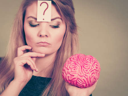 Intellectual expressions, being focused concept. Closeup of attractive woman thinking face...