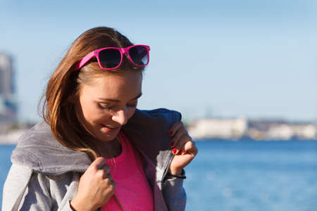 Sport, workout fashion concept. Woman wearing tracksuit resting and relaxing after doing sports...