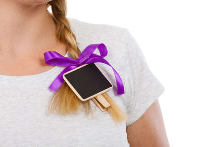 School, education, learning concept. Teenage blonde girl having little blackboards in hair.の写真素材