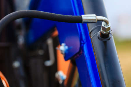 Agriculture equipment concept. Industrial detailed pneumatic, hydraulic machinery made of steel closeupの写真素材