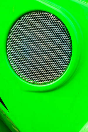 Shapes, patterns and textures concept. Simple round circle shape with grill, ventilation in machineの写真素材