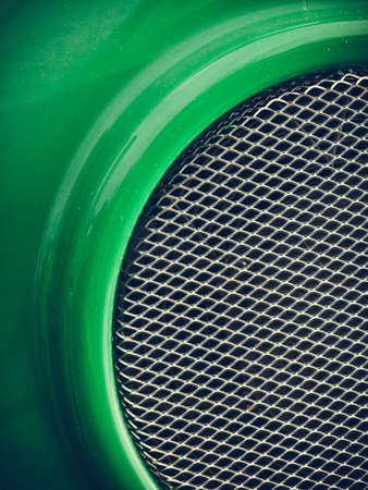 Shapes, patterns and textures concept. Simple round circle shape with grill, ventilation in machineの写真素材