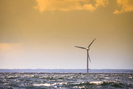 Wind turbines generator farm for renewable sustainable and alternative energy production along coast...