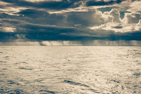 Beautiful seascape evening Baltic sea sunset horizon and cloudy sky. Tranquil landscape scene.
