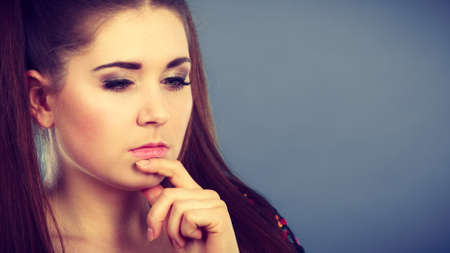 Education, teenage adolescence, happiness concept. Happy teenager student girl with brown ponytails...