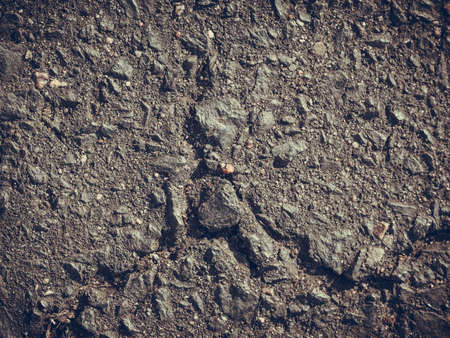 Textures, patterns and backgrounds concept. Grey clay, concrete wall with cracks and inequalitiesの写真素材