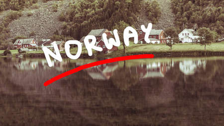 Norwegian country house hytte in the mountains. Beautiful coastline fjords landscape in Norway, Scandinavia Europeの写真素材