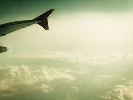 Idyllic views, landscapes, beauty of nature concept. Beautiful white clouds and blue sky, view from airplane.の写真素材