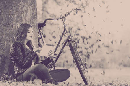 Relax leisure nature outdoor internet technology concept. Redhead lady under tree. Young girl...