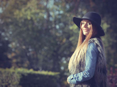 Fashion and style of female. Attractive and fashionable woman outdoor. Portrait of charming young...