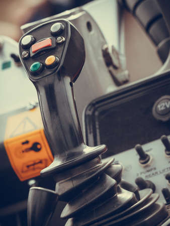 Agriculture equipment, agribusiness machinery and vehicles concept. Operating system on big industrial agricultural machineの写真素材